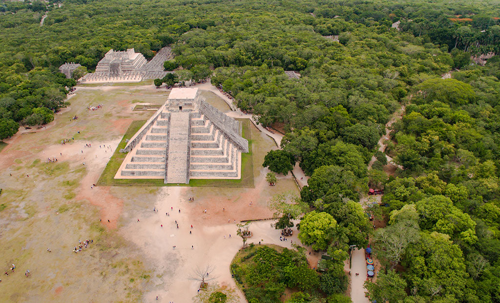 Aerial shot of Chichen Itza Archaeological Site. Kukulcan Pyramid and mayan jungle